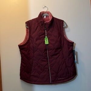 Women’s size extra large, reversible vest new with tag